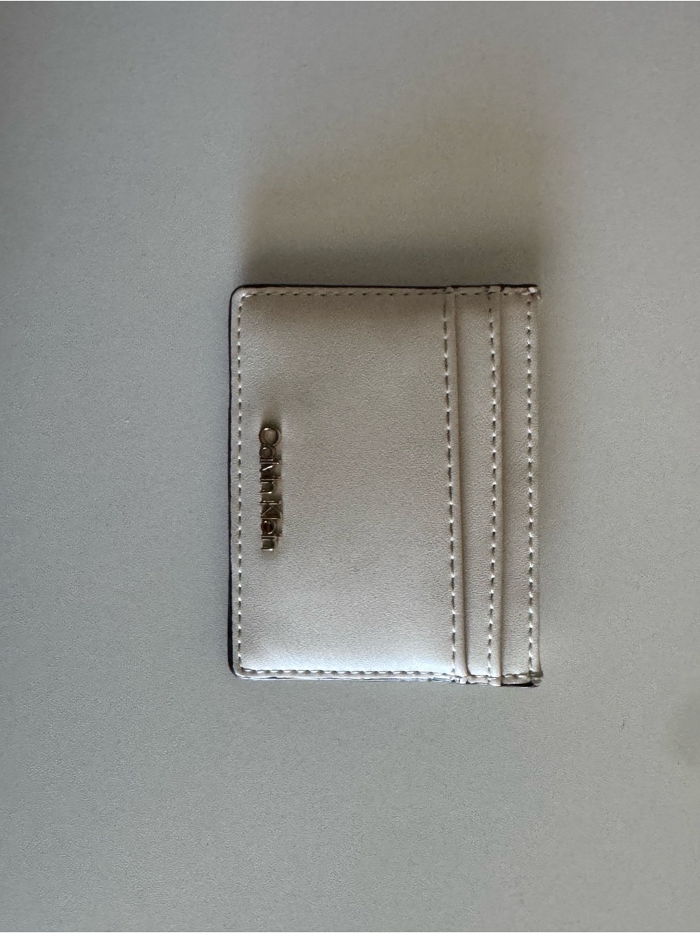 Calvin Klein Metallic Silver Cardholder with Gold Logo